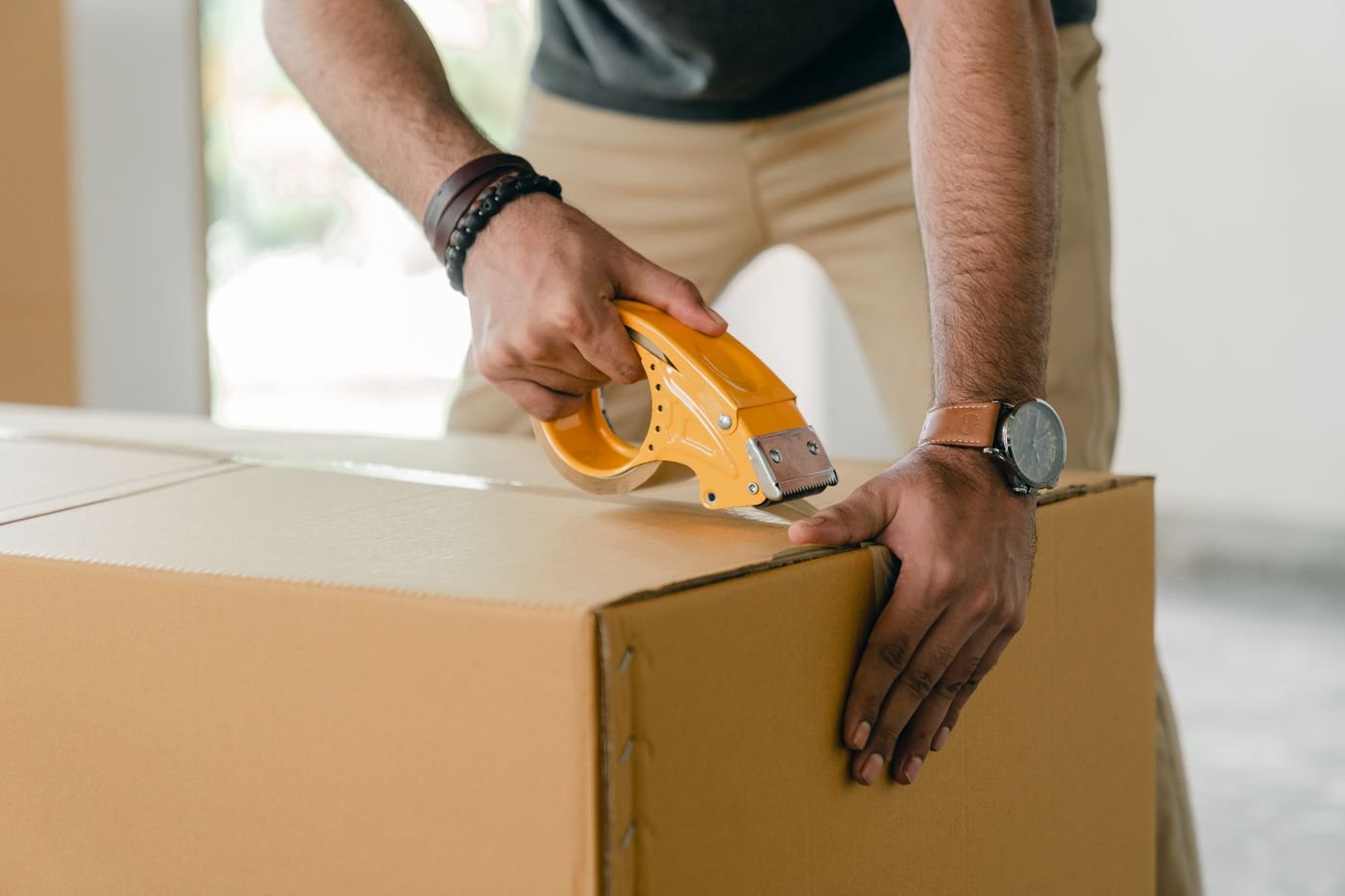 Packing household items for home junk pickup